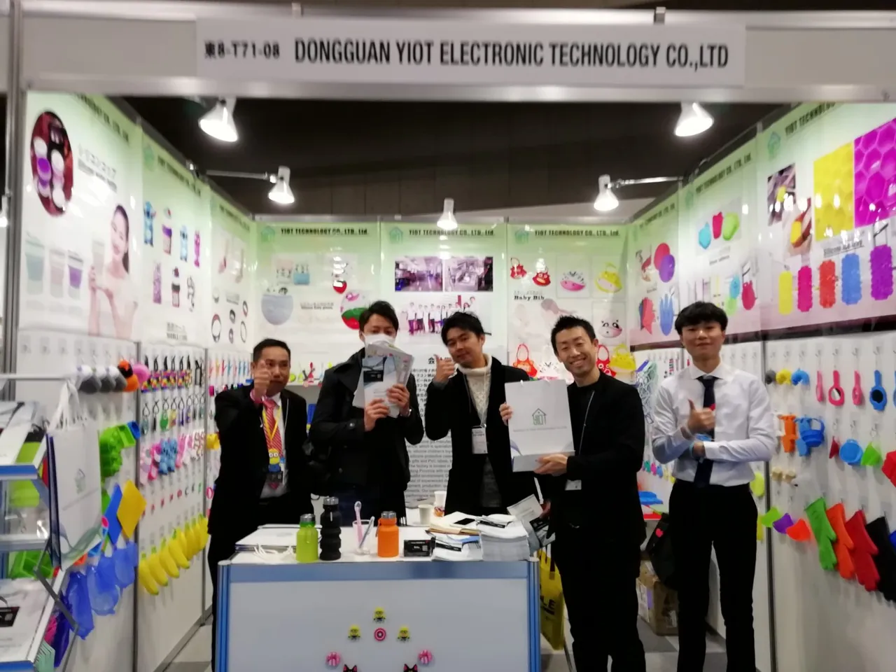 Group photograph at the exhibition booth